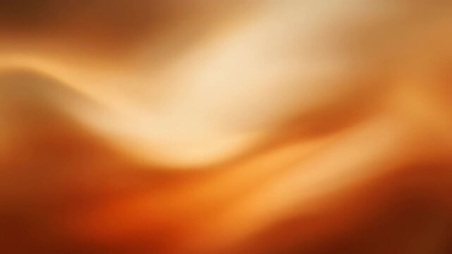 Abstract blurred background with warm orange and beige gradient colors