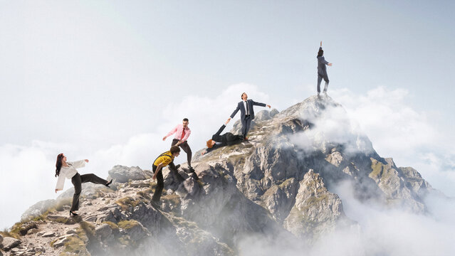 Business people struggling on mountain peak as corporate teamwork and competition. Concept of leadership under pressure, crisis management, team resilience, achieving business goals.
