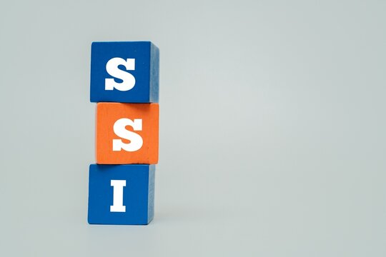 Colorful blocks with text SSI. SSI acronym for "SELF SOVEREIGN IDENTITY". A concept for decentralized digital identity, blockchain security, user privacy, and data ownership