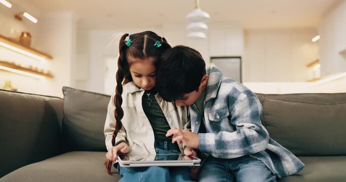 Kids, siblings and tablet in house for learning, play game and bonding together on weekend. Children, tech and relax on sofa for educational gaming, puzzle app and click for online development