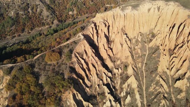 Aerial Sunset view of rock formation Stob pyramids, Rila Mountain, Kyustendil region, Bulgaria