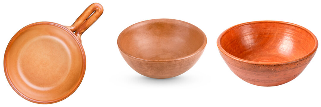 Three terracotta bowls and a frying pan isolated on a white background