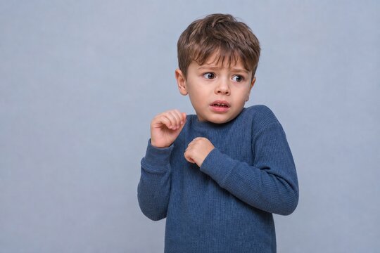 Little boy's vulnerable expression reveals a profound sense of alarm