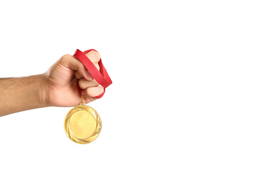 Hand Holding Gold Medal On Red Ribbon Isolated Transparent Background