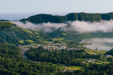 Fototapeta premium Sete cidades village and lake with clouds são miguel azores