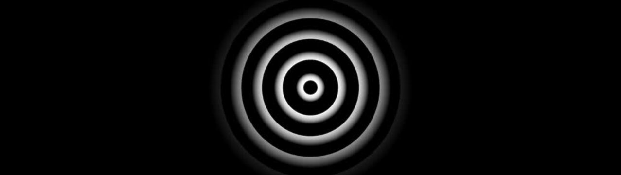 Abstract concentric circles pulsing motion background, in monochrome.Pulsing concentric circles abstract motion background