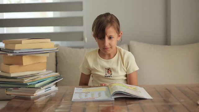 Schoolgirl frustrated while doing homework at home