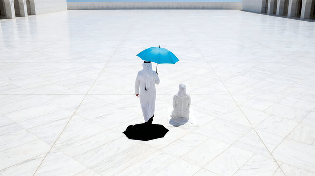 Arab man holding blue umbrella over woman in white at mosque courtyard