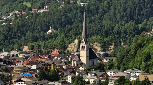 Beautiful aerial landscape of Imst Tyrol featuring cathedral architecture charming alpine town streets and breathtaking mountain scenery in Austria