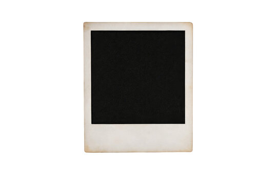 A vintage blank photo frame with slightly aged white borders and a black center, isolated on transparent background, showing classic instant photo style suitable.