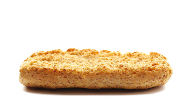 Crusty bread, wholemeal grains, with wholemeal flour with broad-leaf bran isolated on white background, side view
