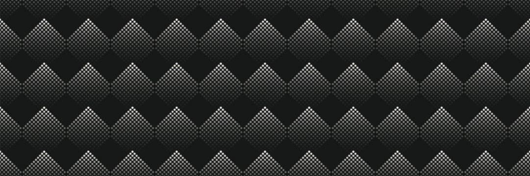 Repeating abstract geometric pattern of dotted hexagons and diamonds fading on black background. Carbon texture banner.