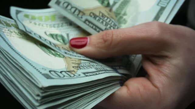 hand with money dollar. dollar money. woman counting money cash. business crisis finance dollar lifestyle concept. close up of a hand counting paper dollars. exchange finance economy dollar usd