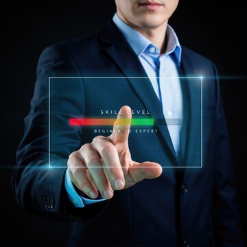 Skill level progress bar on virtual interface, businessman touching digital beginner to expert scale, professional competency and career growth concept