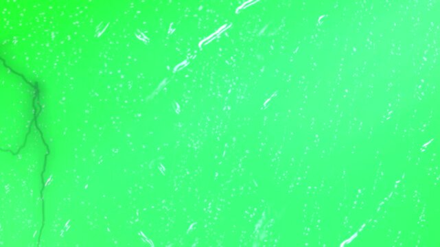 Vibrant green lightning strikes flash across a glowing atmospheric sky background for dynamic motion graphics and digital abstract cinematic visual effects