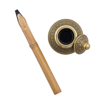 Traditional Arabic Calligraphy Pen and Inkpot Isolated on White Background