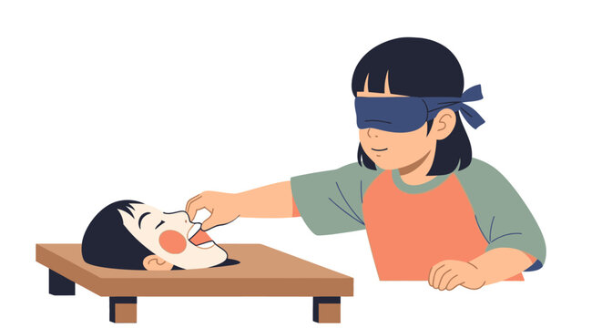 Blindfolded child playing party game with pi&ntilde;ata.