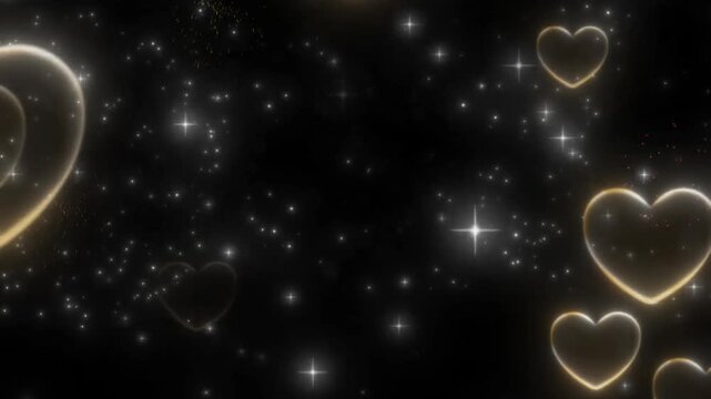 Vibrant fireworks display with glowing golden heart shapes and shimmering stars on a deep black background for romantic celebrations
