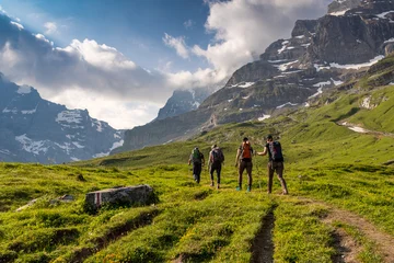 Hiking Group on Alpine Trail in Bernese Alps, Kiental Region, Switzerland © schame87