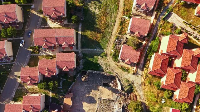 Elenite faces recovery from flood damage as homes and streets show signs of water impact and debris. The community begins to assess the situation and plan for repairs.