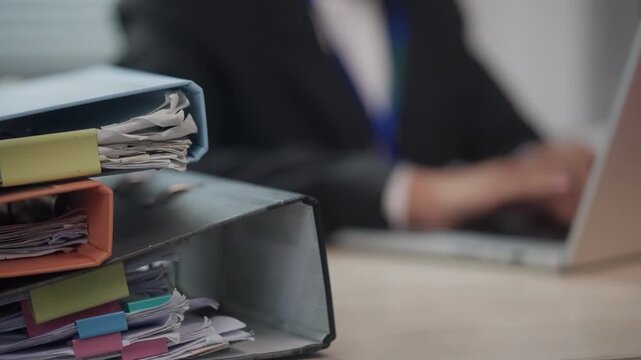 Organized File Binders and Business Documents in Modern Office