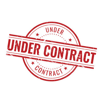circular red distressed rubber stamp with under contract text design