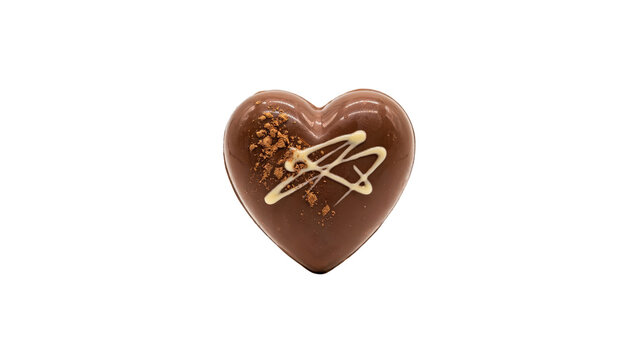 Single glossy milk chocolate heart truffle decorated with white chocolate drizzle and cocoa powder dusting for a romantic valentine holiday gift isolated on transparent background