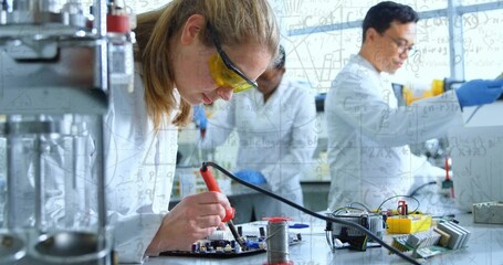 Woman in tech picking soldering iron, fixing PCB for tests with animated markers overlaying joints © vectorfusionart
