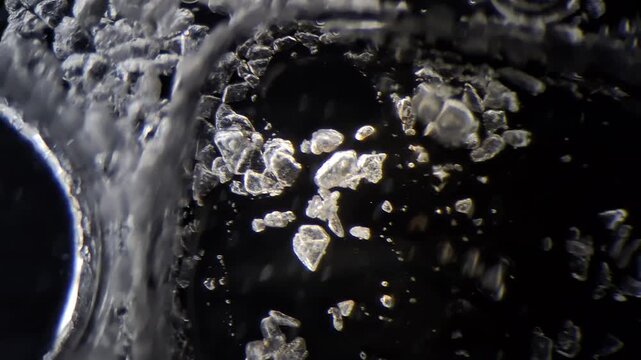 Chemical reaction between vinegar and baking soda under microscope, acid base substance interaction