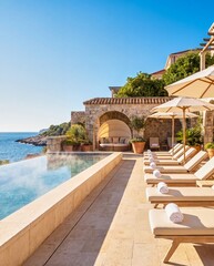 Fototapeta premium Luxury Mediterranean resort swimming pool with coastal views