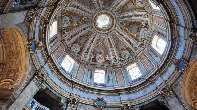 Magnificent Baroque dome fresco painting inside a historic Roman church