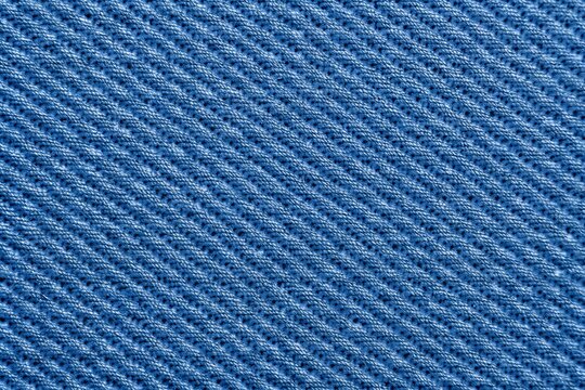 close up of blue twill fabric texture with diagonal lines