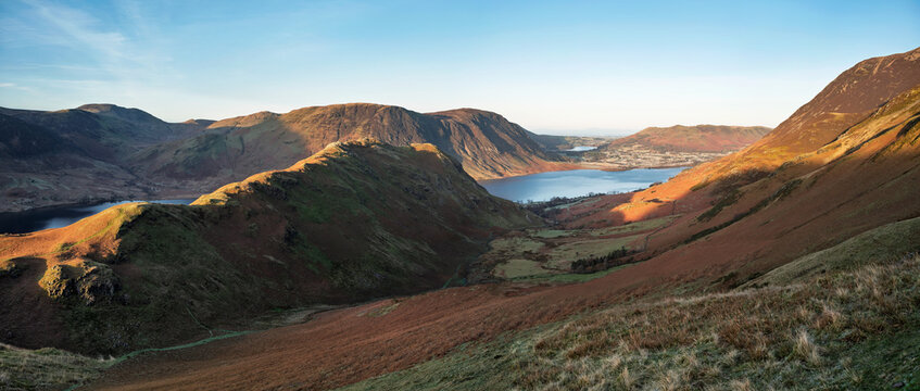 Views of Low Bank, Rannerdale, Mellbreak  andd Crummock Water in the Lake District at sunrise from below Whiteless Pike  in Cumbria, England UK.