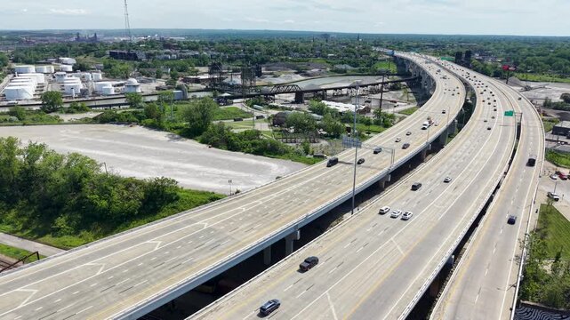 Aerial footage of cars driving on the highway in downtown Cleveland Ohio USA