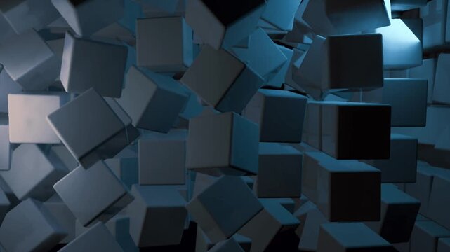 Abstract loopable animation of dark gray and blue 3D cubes floating and spinning slowly.