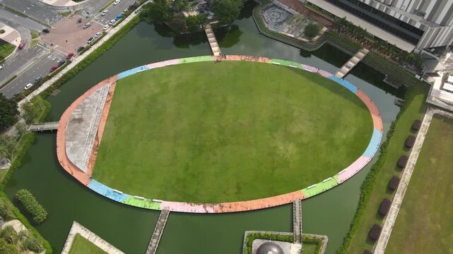 Top-Down Drone View of Landscaped Oval Park and Water Feature in Setia Alam, Shah Alam, Malaysia