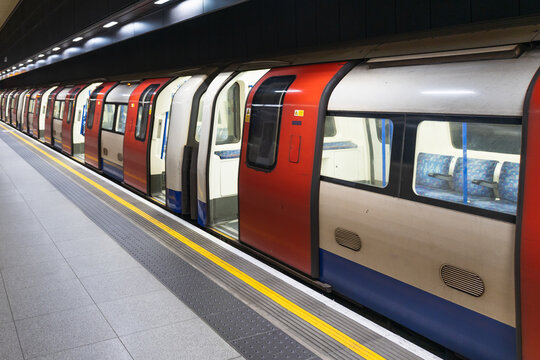 London Underground train with open doors at a platform