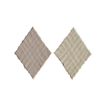 Pair of quilted diamond shaped textile swatches with cross stitched detail swatches stitched isolated background geometric material abstract composition materiality
