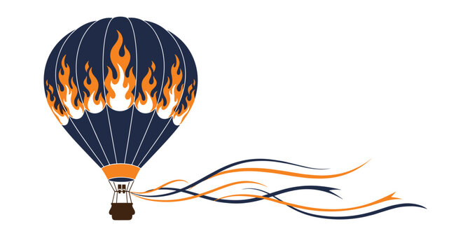 Dark blue hot air balloon decorated with bright orange flames trailing long colorful ribbons in the open sky.
