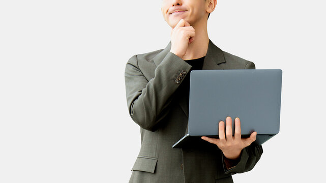ノートパソコンを持って考える男性ビジネスマン, Businessman Thinking with a Laptop Computer
