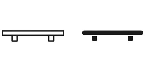 Simple line drawing of a skateboard deck with two trucks in white and black silhouettes © MONWARA STOCK