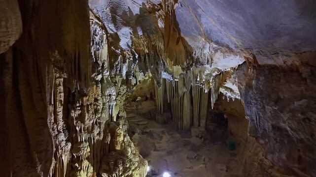 Undergroung caves. Expansive Underground Chamber Cave Decorated With Stalactites And Formations