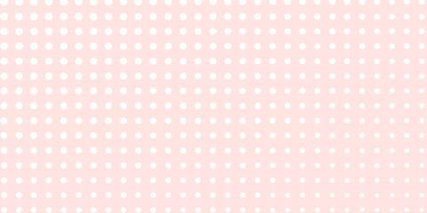 white polka dots pattern over misty rose useful as a background © MAS
