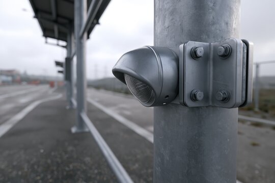 Reflector Cap Mounted on Metal Post at Commuter Shuttle Stop