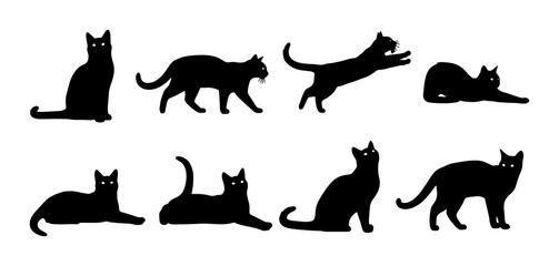 Fototapeta premium Black Cat Silhouettes Collection: Diverse Poses, Vector Art for Pet Lovers, Wildlife Graphics, and Halloween Themes