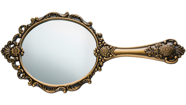 Antique ornate hand mirror with decorative floral motifs