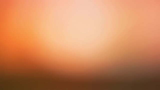 Soft Warm Light Flowing Motion Background. Blurred Peach Orange Gradient Bokeh Effect.
