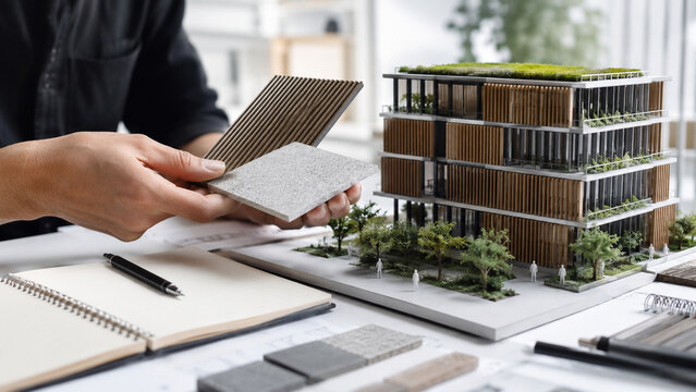 Architect reviewing passive cooling for urban buildings for modern