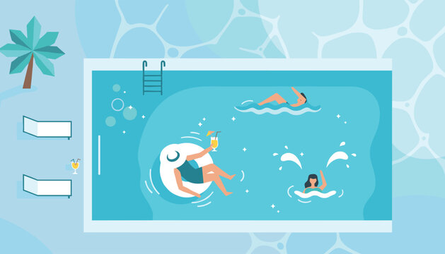 High angle view of relaxed people swimming and sunbathing inside a beautiful backyard swimming pool on vacation.