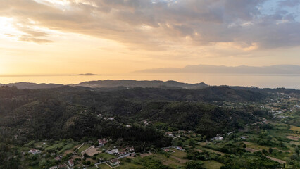 Fototapeta premium Golden hour light illuminating rural Corfu landscape